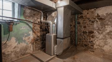 Unfinished basement with furnace